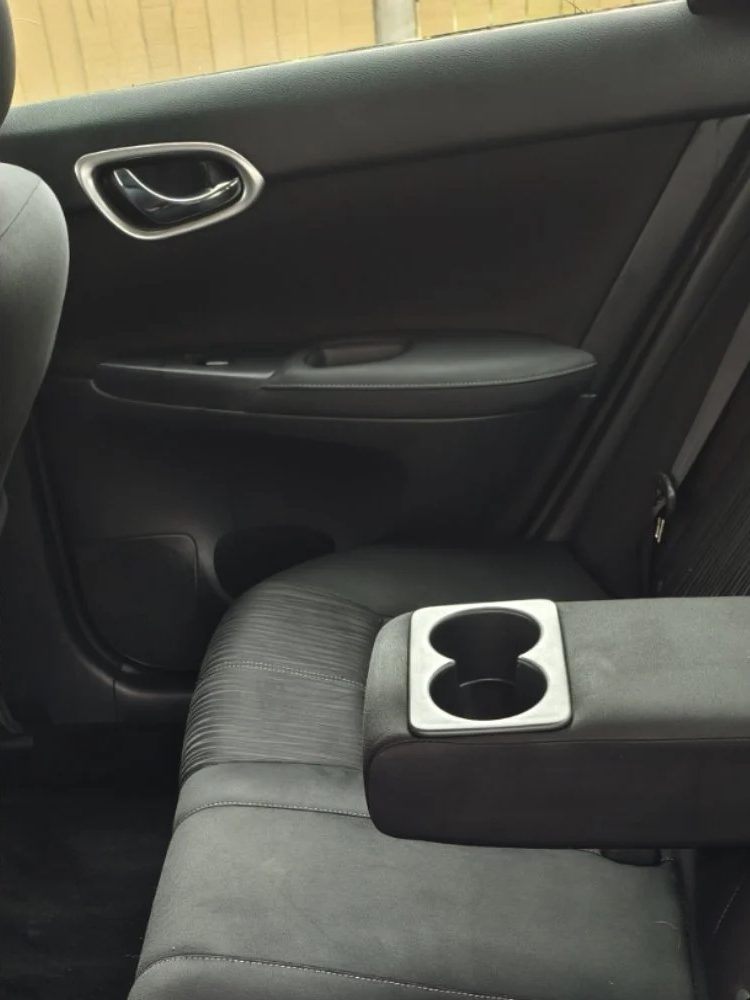 Rideshare sedan rear seat after Downtown Miami mold removal