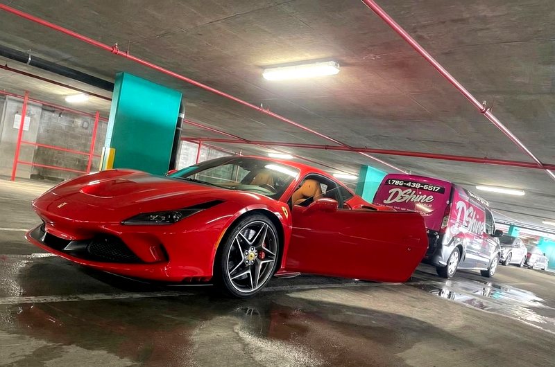 DShine mobile detailing van next to Ferrari F8 in Miami building garage — we come to your location